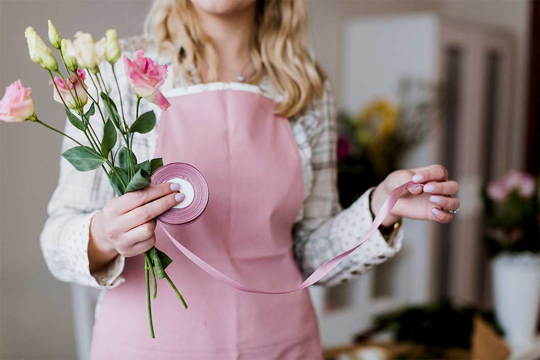 woman with roses ribbon